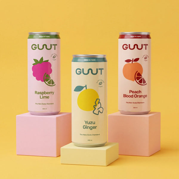 A collection of GUUTSy mixed pack prebiotic beverage cans stacked elegantly for display.